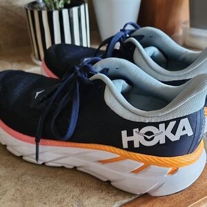 Hoka Athletic Shoes in Navy, Orange, and Pink